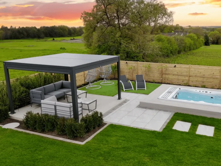 Modern finish outdoor patio with a contemporary black aluminum pergola, luxury hot tub, and modular outdoor sectional seating.